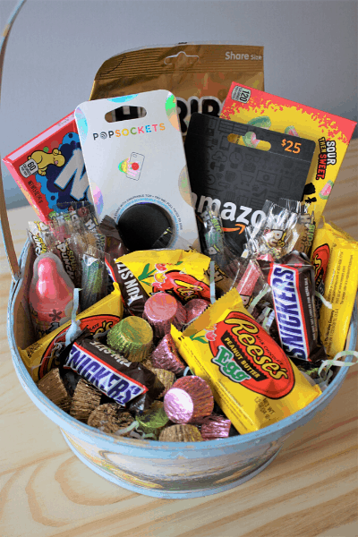 pre-teen Easter basket with candy, amazon gift card, and a pop socket