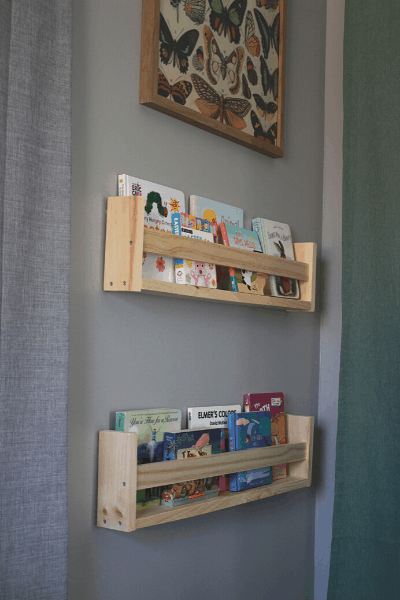 two diy ikea bookshelves hanging on the wall with books inside