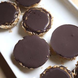 no bake oat cups with cashew butter on a long white plate