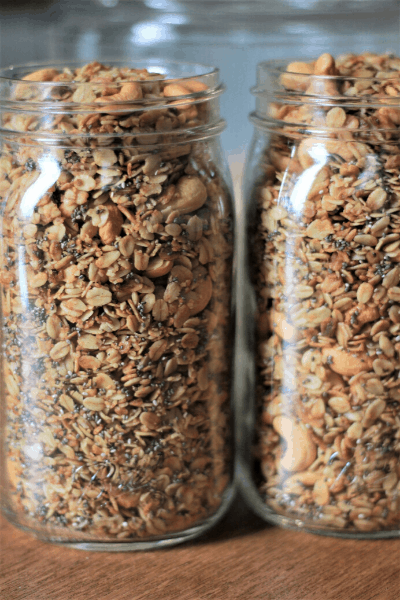 two mason jars filled with easy granola recipe